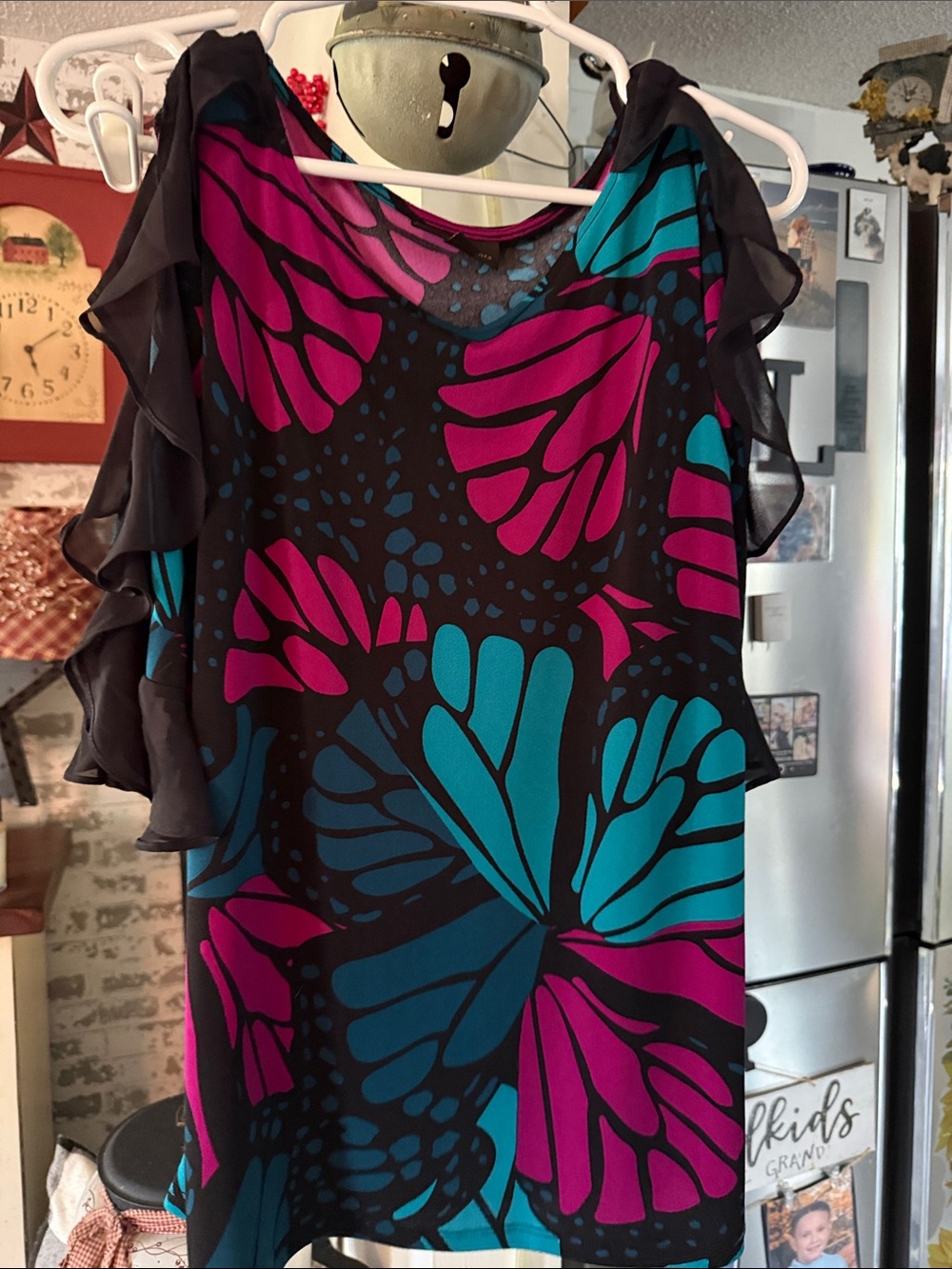 BOLD elements Black Sheer Ruffle Sleeve Top with Teal & Magenta Floral Print